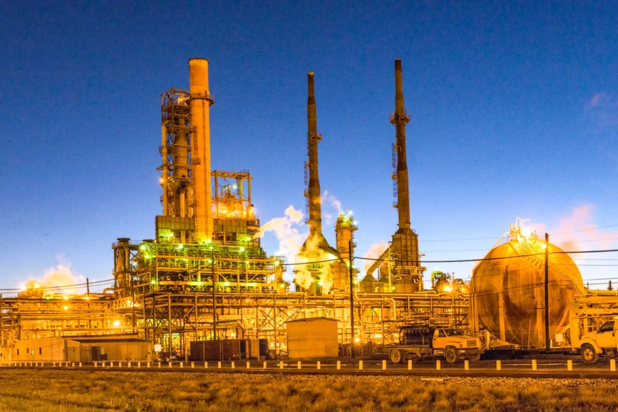 Industrial processing plant with towers and pipework
