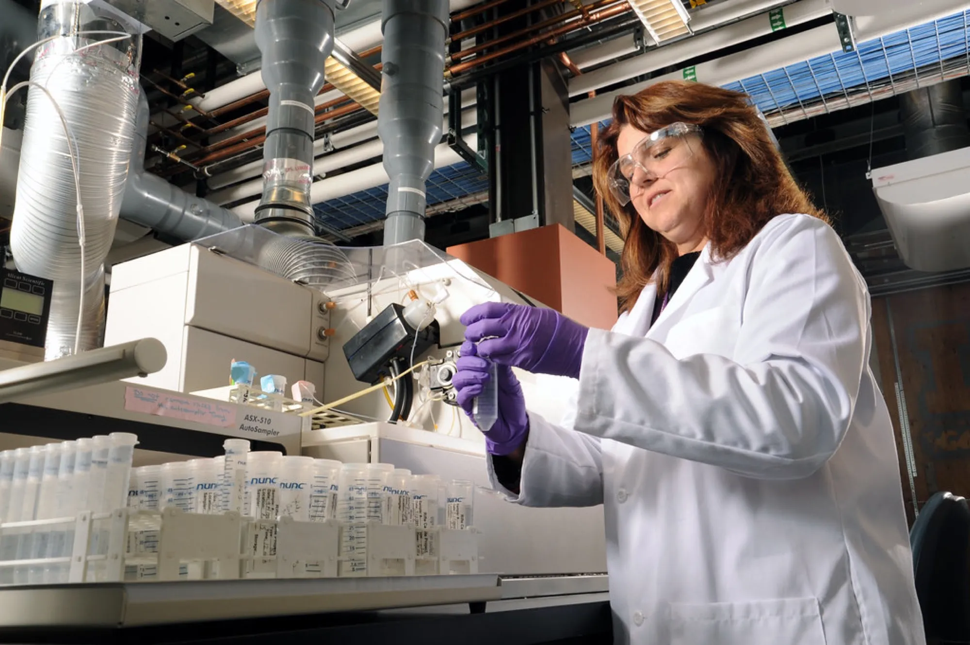Technician analysing samples in a laboratory